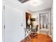 Hallway office featuring a glass desk with a view of the bathroom at 720 Governor Morrison St # 207, Charlotte, NC 28211