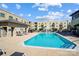 Inviting swimming pool surrounded by lounge chairs, perfect for relaxation and enjoying the outdoors on sunny days at 720 Governor Morrison St # 207, Charlotte, NC 28211