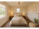 Comfortable bedroom with neutral decor, bedside tables, and natural light at 720 Holmes St, Salisbury, NC 28144