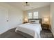 Bright and airy bedroom with modern lighting, minimalist decor, and comfortable bedding for restful nights at 720 Holmes St, Salisbury, NC 28144