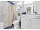 Charming bathroom featuring custom shower curtain, a modern sink, toilet, and cabinetry at 805 Deep River Way, Waxhaw, NC 28173