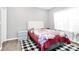 Cozy bedroom featuring neutral walls, wood-look floors, and a plush patterned bedspread at 805 Deep River Way, Waxhaw, NC 28173