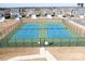 Community tennis courts enclosed by black chain link fence in a residential neighborhood at 805 Deep River Way, Waxhaw, NC 28173