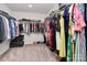 Expansive walk-in closet with ample hanging space, shelving, and room for shoes and accessories at 805 Deep River Way, Waxhaw, NC 28173