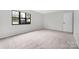 Bedroom featuring a large window bringing in natural light at 8057 Cedar Glen Dr, Charlotte, NC 28212