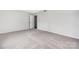 Spacious bedroom featuring neutral walls, carpet, and a closet at 8057 Cedar Glen Dr, Charlotte, NC 28212