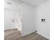 Laundry room with tile flooring and access to an outdoor door at 8057 Cedar Glen Dr, Charlotte, NC 28212