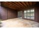 The covered patio with ceiling details and door leading to outside offers outdoor living space at 8057 Cedar Glen Dr, Charlotte, NC 28212