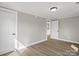 Bedroom with hardwood floors, neutral paint and two large closets at 811 Austin St, Albemarle, NC 28001