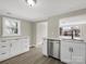 Spacious kitchen featuring stainless steel appliances and bright white cabinets and countertops at 811 Austin St, Albemarle, NC 28001