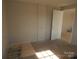 Bright bedroom featuring a brick column, unfinished floors and trimwork awaiting upgrades and personalization at 915 Chapel St, Landis, NC 28088