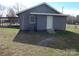 Exterior view of home featuring a side door entrance and a well-maintained lawn at 915 Chapel St, Landis, NC 28088