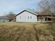 Traditional home with a well-maintained lawn and charming architectural details at 915 Chapel St, Landis, NC 28088