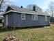 Home exterior featuring classic architecture and a neatly kept lawn and landscape at 915 Chapel St, Landis, NC 28088