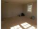 Spacious room filled with natural light, smooth plywood flooring, and fresh neutral paint ready for renovation at 915 Chapel St, Landis, NC 28088