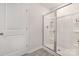 Bathroom shower featuring a glass enclosure, built-in shelving, and modern fixtures at 1011 20Th Avenue Se Loop, Hickory, NC 28602