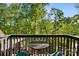 Relax on this balcony with seating and enjoy tree views in a natural setting at 106 Mcnaron Ln, Mooresville, NC 28117