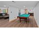 Basement featuring a pool table, sitting area, and finished ceilings at 106 Mcnaron Ln, Mooresville, NC 28117
