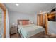 Inviting bedroom with hardwood floors, a queen-sized bed, and a tranquil ambiance at 106 Mcnaron Ln, Mooresville, NC 28117