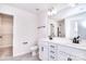Bathroom featuring double sink vanity, tile floors, and walk-in closet at 107 Megby Trl, Statesville, NC 28677