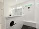 Stylish bathroom featuring glass walk-in shower, bench seating and modern fixtures at 13126 Macon Hall Dr, Mint Hill, NC 28227
