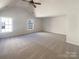 Large carpeted bedroom featuring high ceilings and natural light at 13903 Mallard Roost Rd, Charlotte, NC 28262