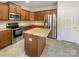 Open kitchen with stainless steel appliances and granite countertops at 13903 Mallard Roost Rd, Charlotte, NC 28262