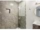 Renovated bathroom featuring hexagon tile, gray and white tile, and upgraded fixtures at 14325 Rocky River E Rd, Davidson, NC 28036