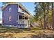 Two-story home with covered porch and lush backyard at 14325 Rocky River E Rd, Davidson, NC 28036