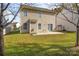 The backyard features a patio with ample space for grilling and outdoor relaxation at 1541 Arborgate Dr, Rock Hill, SC 29732
