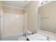 Bright bathroom showcasing tub with shower and neutral walls, along with sleek sink and mirror at 1541 Arborgate Dr, Rock Hill, SC 29732