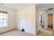 Bright bedroom with window offering natural light and an ensuite bathroom at 1541 Arborgate Dr, Rock Hill, SC 29732