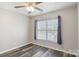 Bedroom with a window allowing natural light, complemented by modern hardwood floors at 1541 Arborgate Dr, Rock Hill, SC 29732