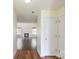 Inviting entryway leading to a spacious living room with hardwood floors and a cozy fireplace at 1541 Arborgate Dr, Rock Hill, SC 29732