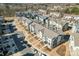 An aerial view highlighting a new construction townhome community with modern architecture at 1645 Unison Dr, Charlotte, NC 28262