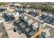 Aerial view features contemporary townhomes, showcasing the community's layout and design at 1645 Unison Dr, Charlotte, NC 28262