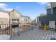 A relaxing balcony view showcases the neighborhood with outdoor seating on a sunny day at 1645 Unison Dr, Charlotte, NC 28262