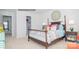 Bedroom featuring a decorative bed, dresser and mirror and access to an ensuite bathroom at 214 Giant Oak Ave, Statesville, NC 28677