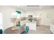 Modern kitchen features stainless steel appliances, a center island with granite countertops, and ample cabinet space at 214 Giant Oak Ave, Statesville, NC 28677