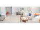 Spacious living room with games, plush sofa, coffee table, and adjacent sitting area at 216 Giant Oak Ave, Statesville, NC 28677