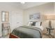 Cozy bedroom featuring stylish decor, soft bedding and a quaint accent table, creating a relaxing atmosphere at 2802 15Th Avenue Se Pl, Hickory, NC 28602