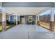 Spacious carport with a solid roof and brick pillars, offering ample parking and protection from the elements at 2802 15Th Avenue Se Pl, Hickory, NC 28602