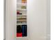 Well-organized closet with built-in shelving, showcasing ample storage space for personal items at 2802 15Th Avenue Se Pl, Hickory, NC 28602