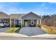Inviting single-story home with a covered parking area and charming outdoor seating at 2802 15Th Avenue Se Pl, Hickory, NC 28602