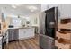Bright kitchen with stainless steel appliances, island with seating, and open view to the living room at 2802 15Th Avenue Se Pl, Hickory, NC 28602