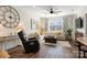 Cozy living room featuring an sectional sofa, modern decor, and ample natural light at 2802 15Th Avenue Se Pl, Hickory, NC 28602