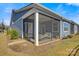 Enclosed screened porch featuring comfortable seating and views of the surrounding backyard at 2802 15Th Avenue Se Pl, Hickory, NC 28602