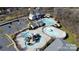 Aerial view of the community pool area with a splash pad, slides, and ample seating at 3004 Fallondale Rd, Waxhaw, NC 28173