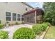 Exterior view of a screened-in porch and lush backyard patio space at 3004 Fallondale Rd, Waxhaw, NC 28173