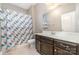 Traditional bathroom featuring a shower/bath combo and single sink vanity at 3004 Fallondale Rd, Waxhaw, NC 28173